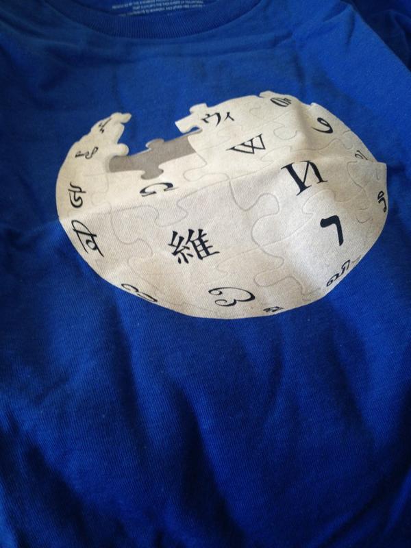 A blue t-shirt featuring the Wikipedia globe