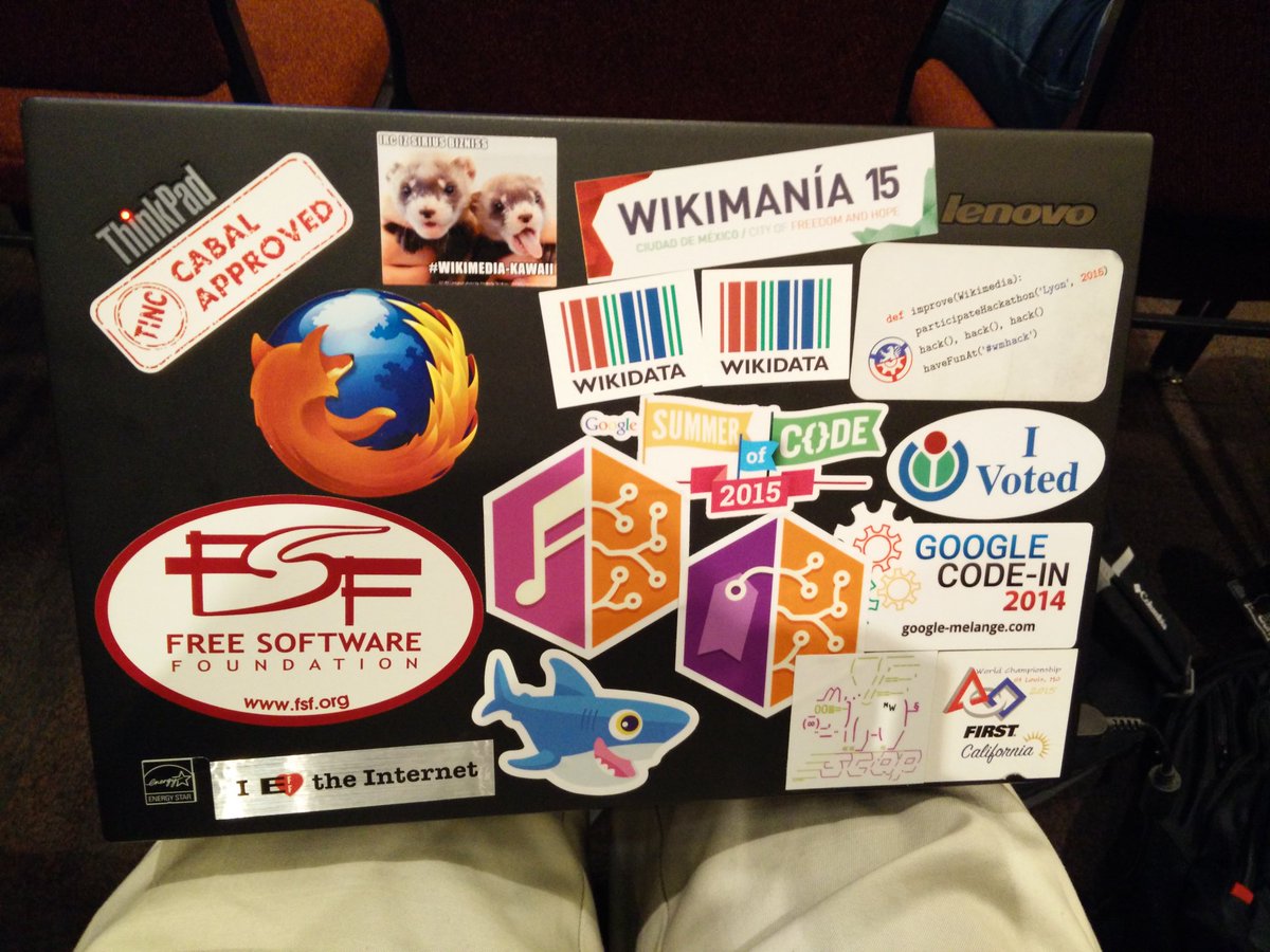 Laptop with two Wikidata stickers next to each other