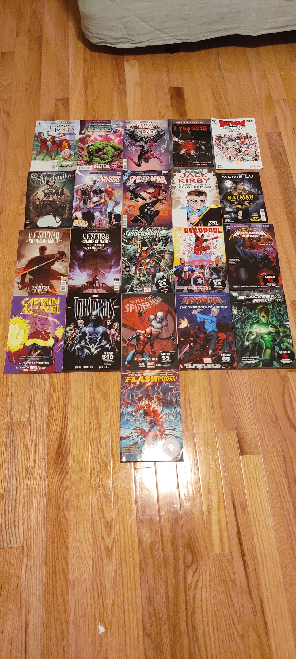 A 4x5 grid of comic books, plus one more at the bottom (Flashpoint)