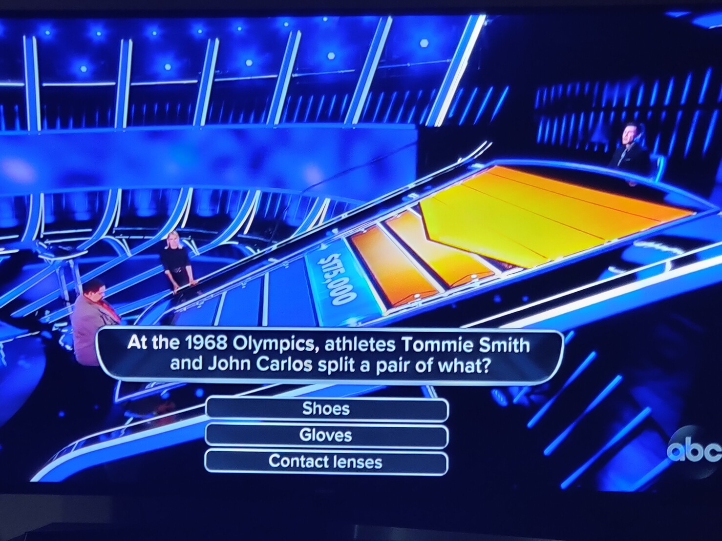 Question from The Chase (US) game show
At the 1968 Olympics, athletes Tommy Smith and John Carlos split a pair of what?
Shoes
Gloves
Contact lenses